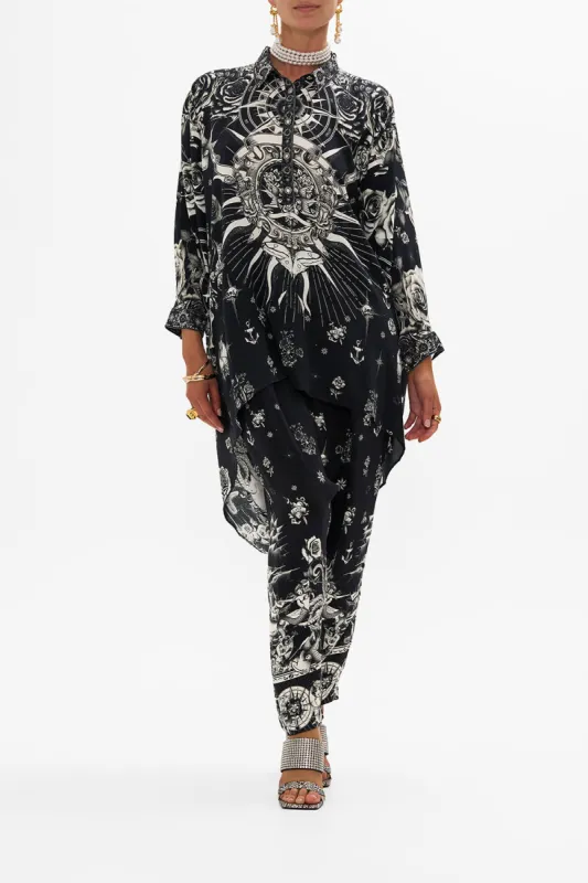 BUTTON UP TOP WITH DRAPED BACK TALES OF TATTOO sold by Camilla