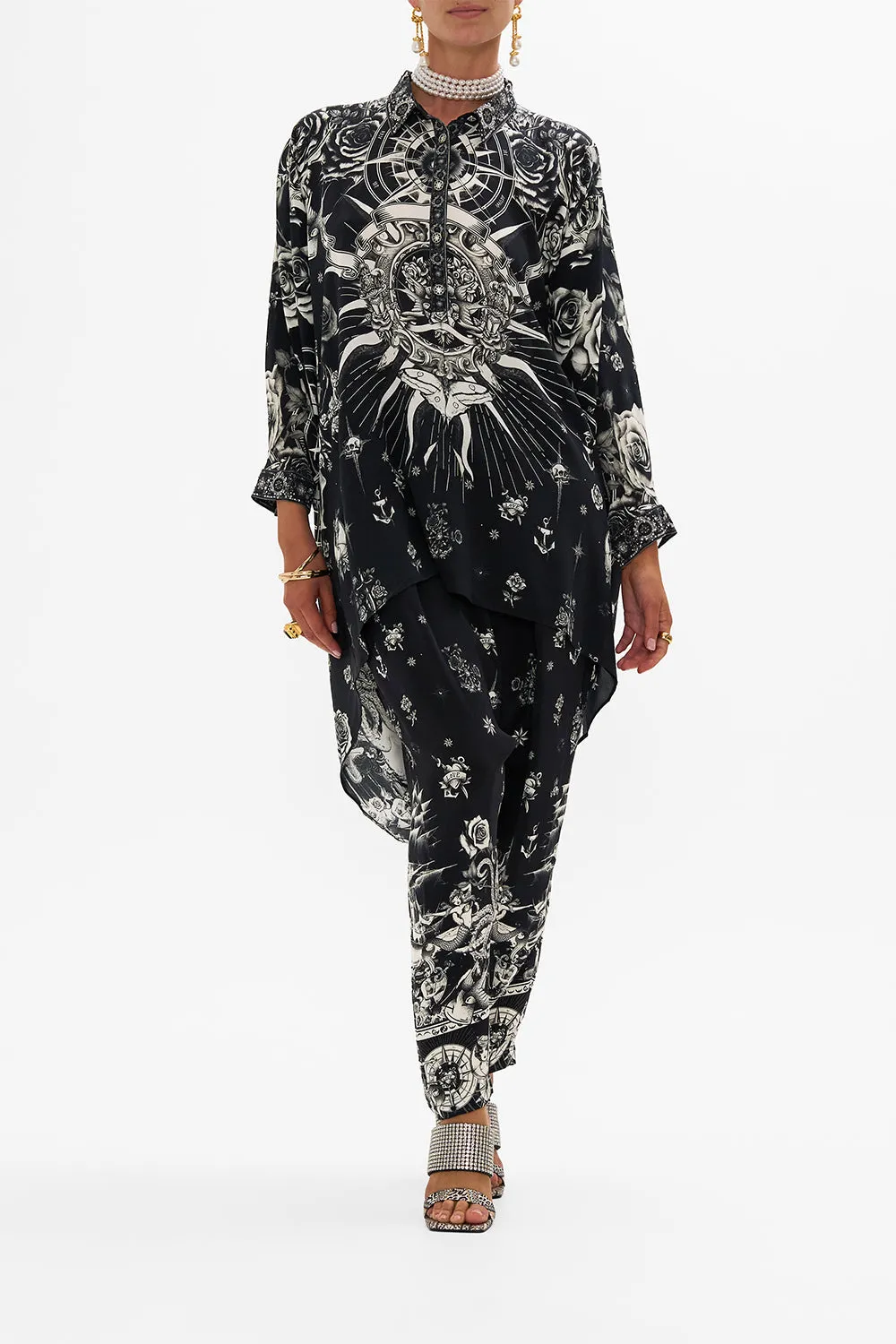 BUTTON UP TOP WITH DRAPED BACK TALES OF TATTOO sold by Camilla