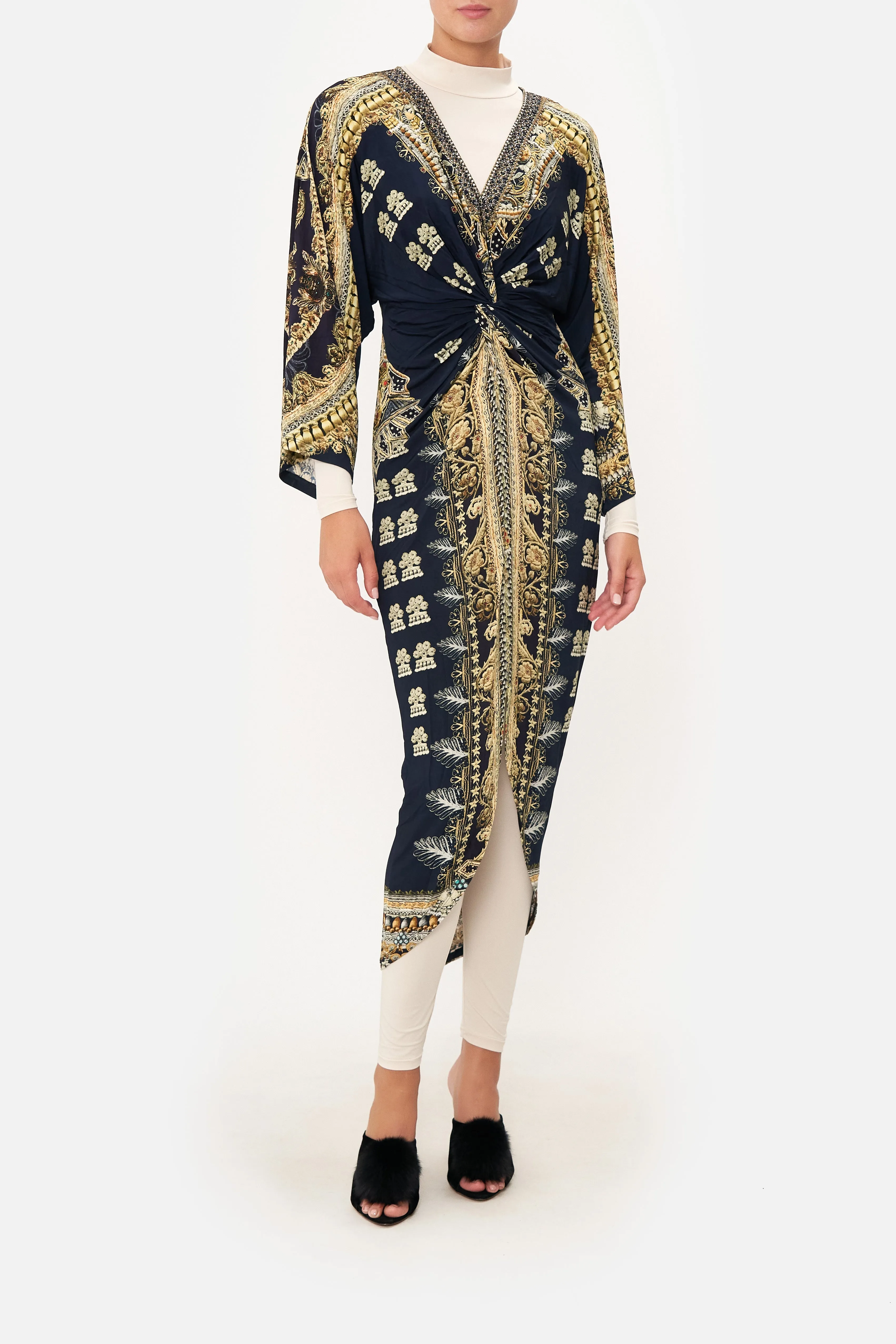 LONG SPLIT FRONT TWIST DRESS ITS ALL OVER TORERO sold by Camilla