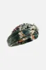 WOVEN TWIST HEADBAND TIGER TRAP sold by Camilla
