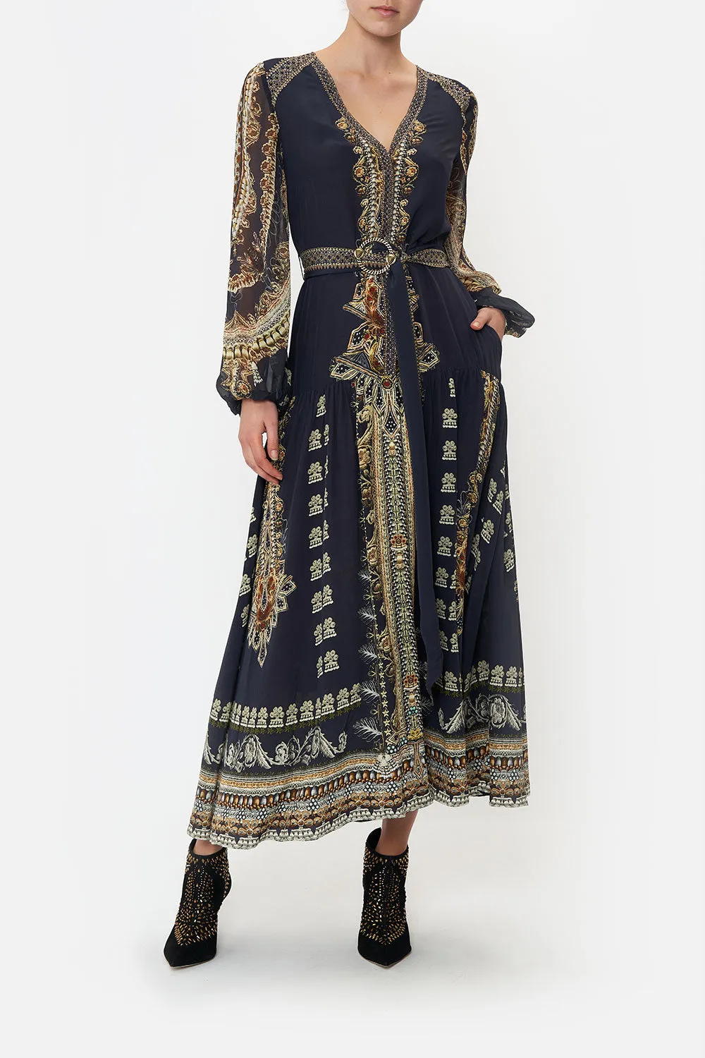 V NECK DRESS WITH BELT ITS ALL OVER TORERO sold by Camilla