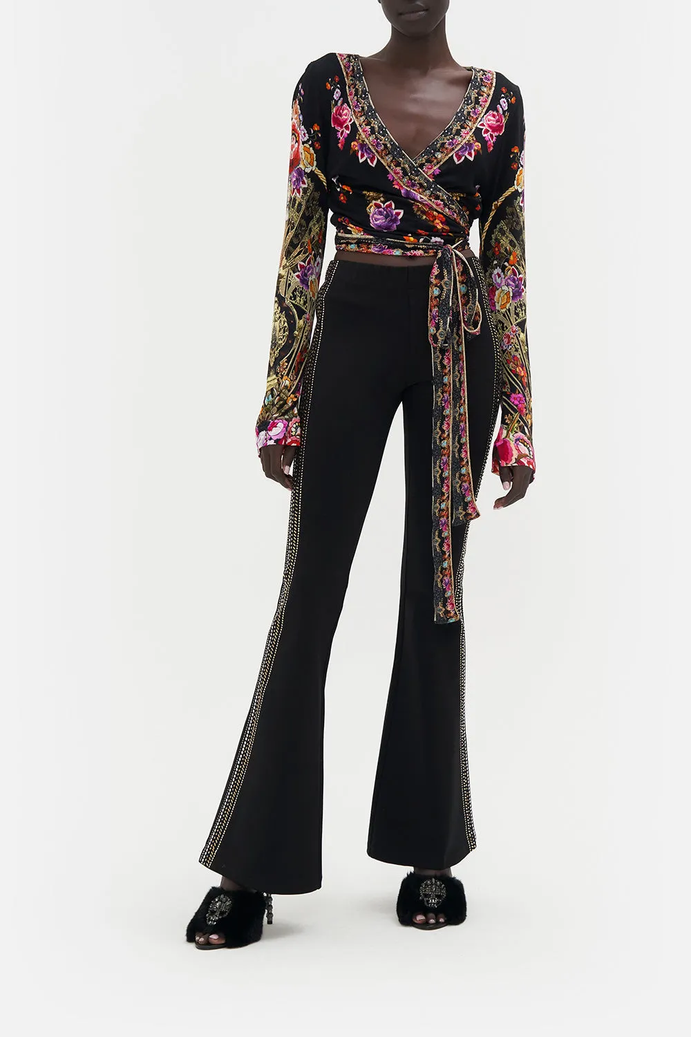 HIGH WAISTED FLARED TROUSER DANCE WITH DUENDE sold by Camilla