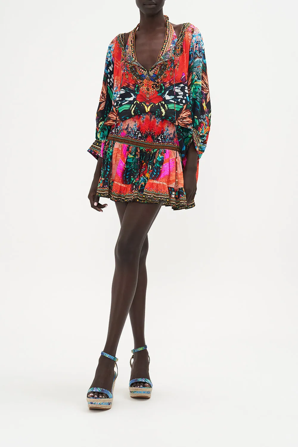 RAGLAN SLEEVE BLOUSE WITH CUFF IN A FLUTTER sold by Camilla