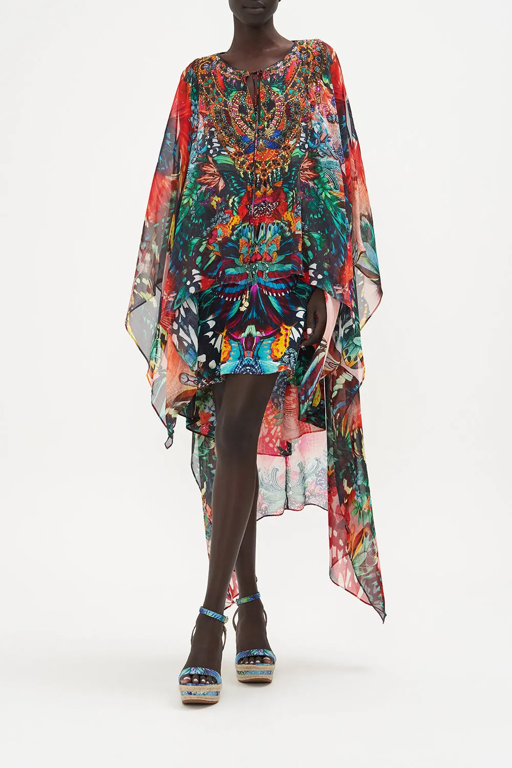 LONG SHEER OVERLAY DRESS IN A FLUTTER sold by Camilla