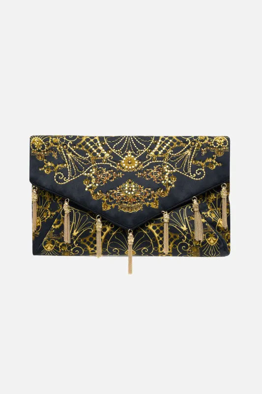 ENVELOPE CLUTCH SHADOWS OF ARMADA sold by Camilla