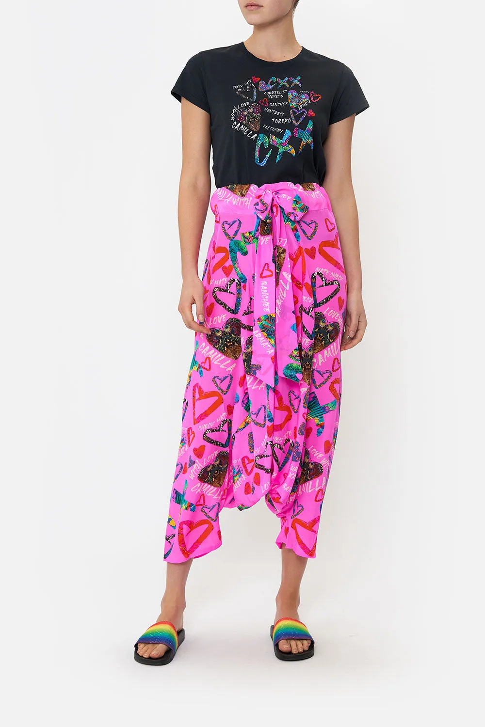 HAREM PANTS WRITINGS ON THE WALL sold by Camilla