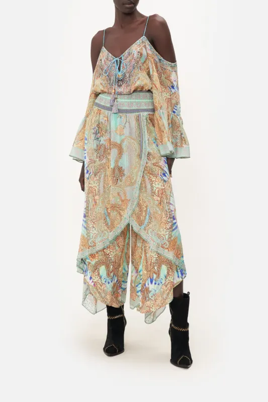 CROSS OVERLAY PANT MAKE LOVE NOT WAR sold by Camilla