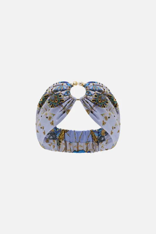 RING HEADBAND UNDER SCARAB SKIES sold by Camilla