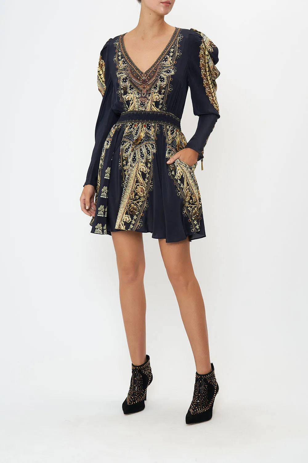 DRAPED SLEEVE SHIRRED DRESS ITS ALL OVER TORERO sold by Camilla