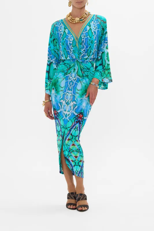 LONG SPLIT FRONT TWIST DRESS LAND OF WONDER sold by Camilla