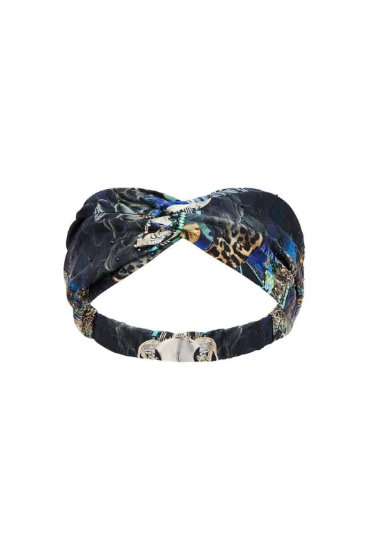 WOVEN TWIST HEADBAND DRIPPING IN DECO sold by Camilla