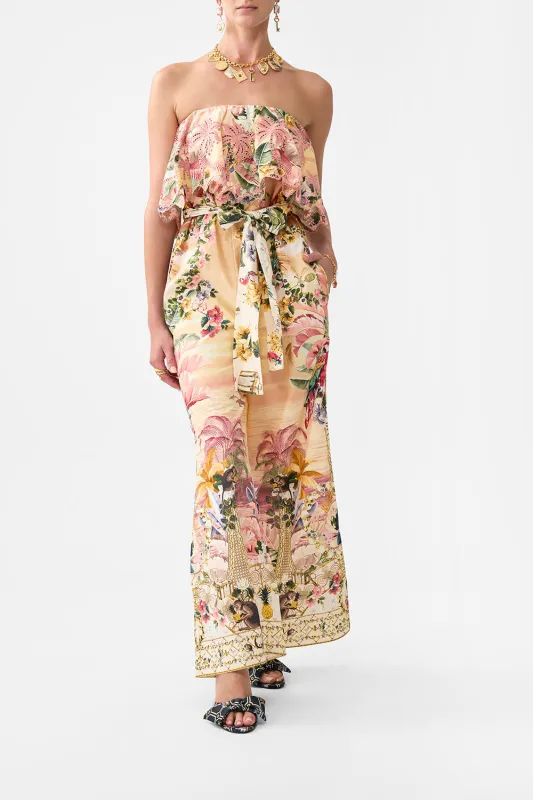 STRAPLESS JUMPSUIT WITH FRILL WELCOME TO THE WHITE LOTUS sold by Camilla