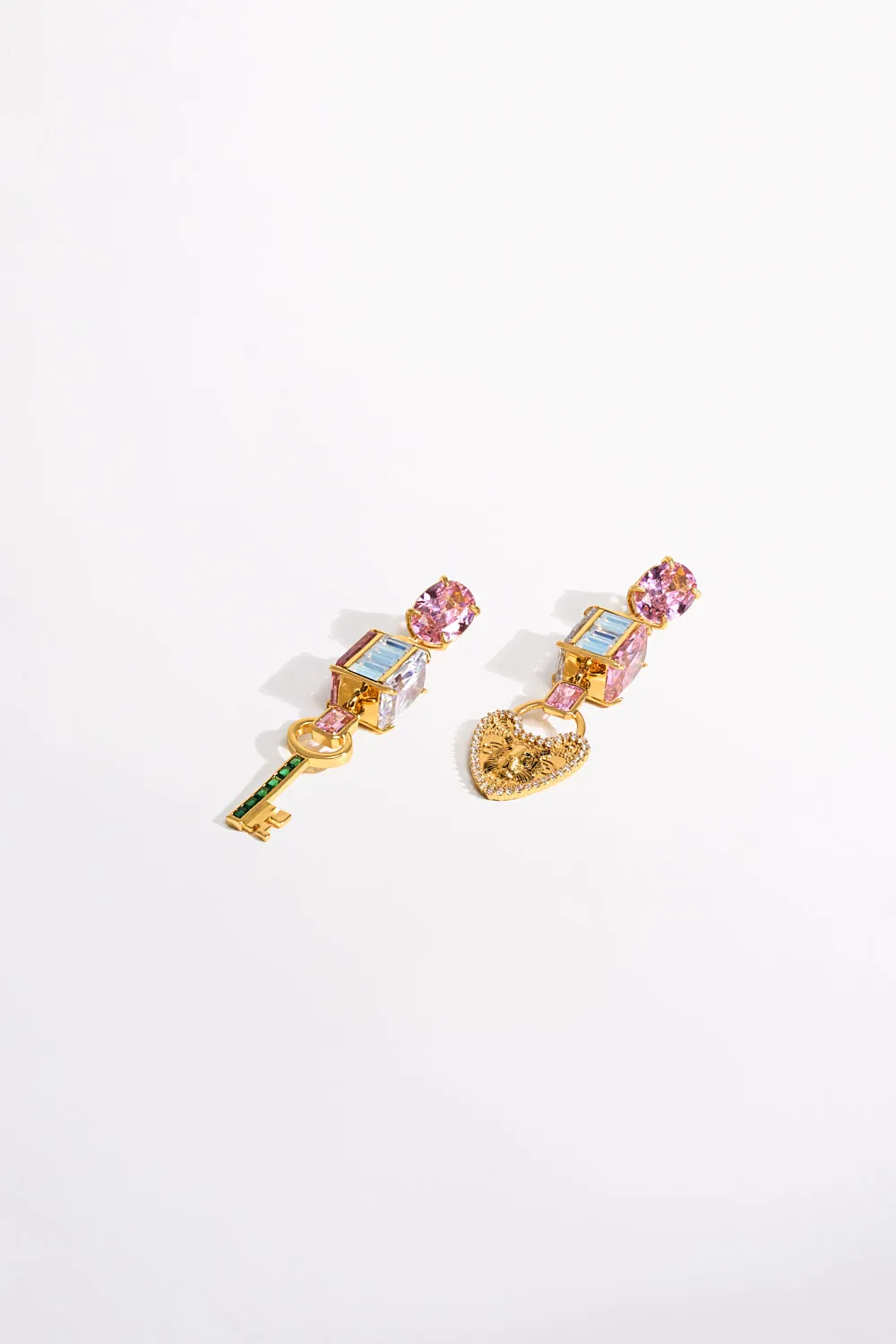 LOCKETS LOADED STATEMENT EARRINGS GOLD sold by Camilla