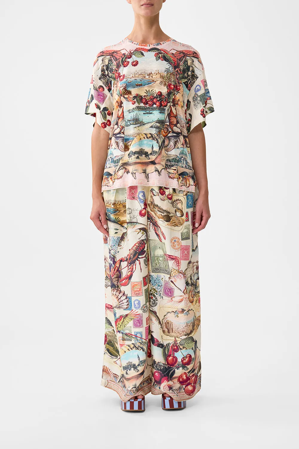 PANELLED SIDE SPLIT TEE NOTES FROM THE ROAD sold by Camilla