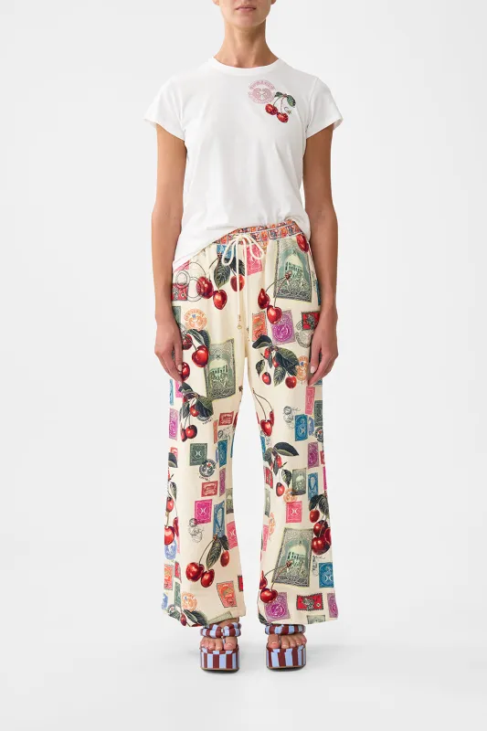 STRAIGHT LEG TRACK PANT NOTES FROM THE ROAD sold by Camilla