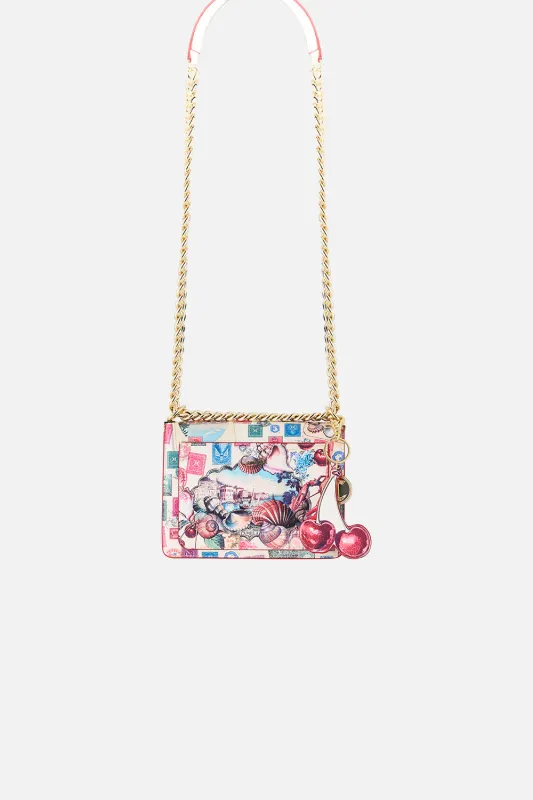 CROSSBODY BOX BAG WITH CHAIN AND KEYRING NOTES FROM THE ROAD sold by Camilla