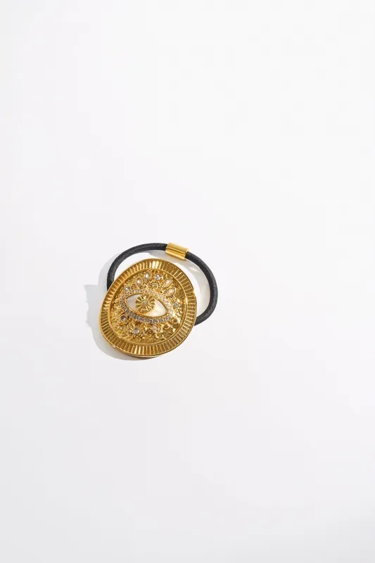 ENCHANTED OCEANIA HAIR TIE GOLD sold by Camilla