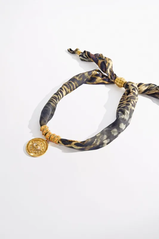 ENCHANTED OCEANIA SILK NECKLACE GOLD sold by Camilla