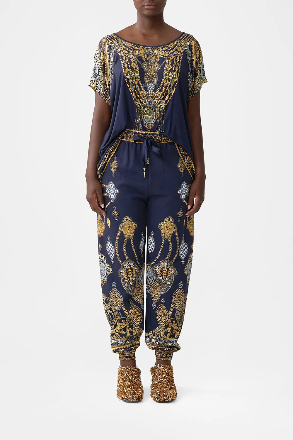 JERSEY TRACK PANT WITH SILK DETAILS THE IMPERIAL GATE sold by Camilla