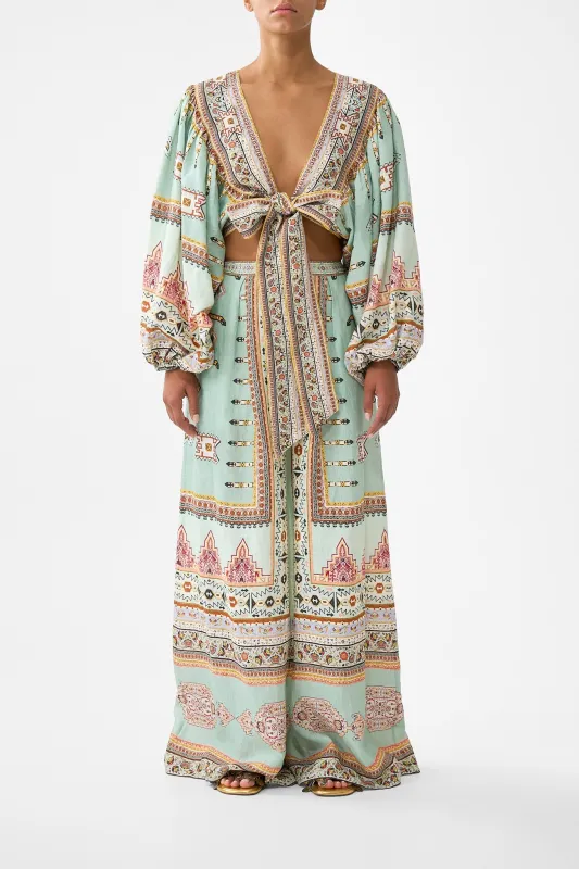 CROPPED BLOUSON SLEEVE TIE FRONT TOP LEGEND HAS IT sold by Camilla