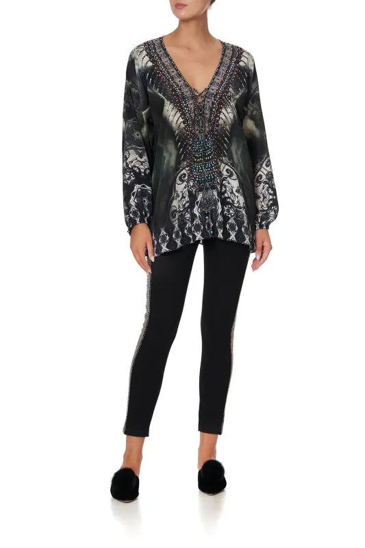 LACE UP BLOUSE IN THE SHADOWS sold by Camilla