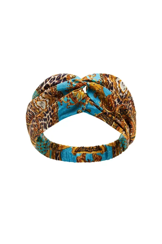 WOVEN TWIST HEADBAND DRIPPING IN DECADENCE sold by Camilla