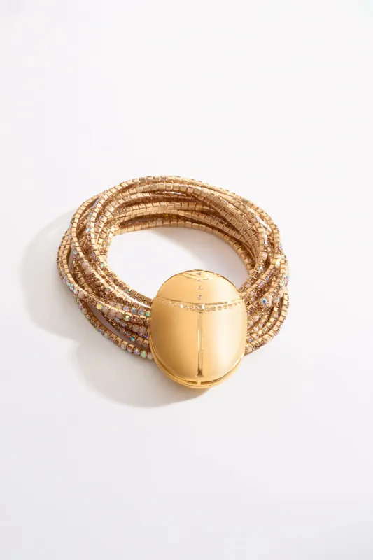 SACRED SYMBOLS STRETCH BRACELET GOLD sold by Camilla