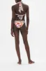 SOFT TIE BIKINI WITH TRIM DUTCH IS LIFE sold by Camilla