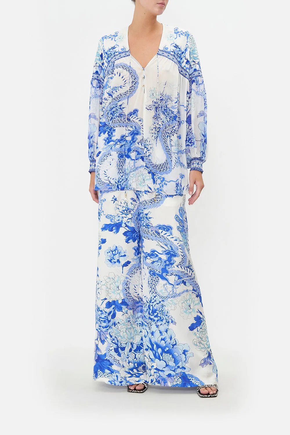 BLOUSON BLOUSE WITH NECK TIE HEART OF A DRAGON sold by Camilla