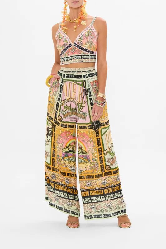 TUCK FRONT PANT LETS CHASE RAINBOWS sold by Camilla