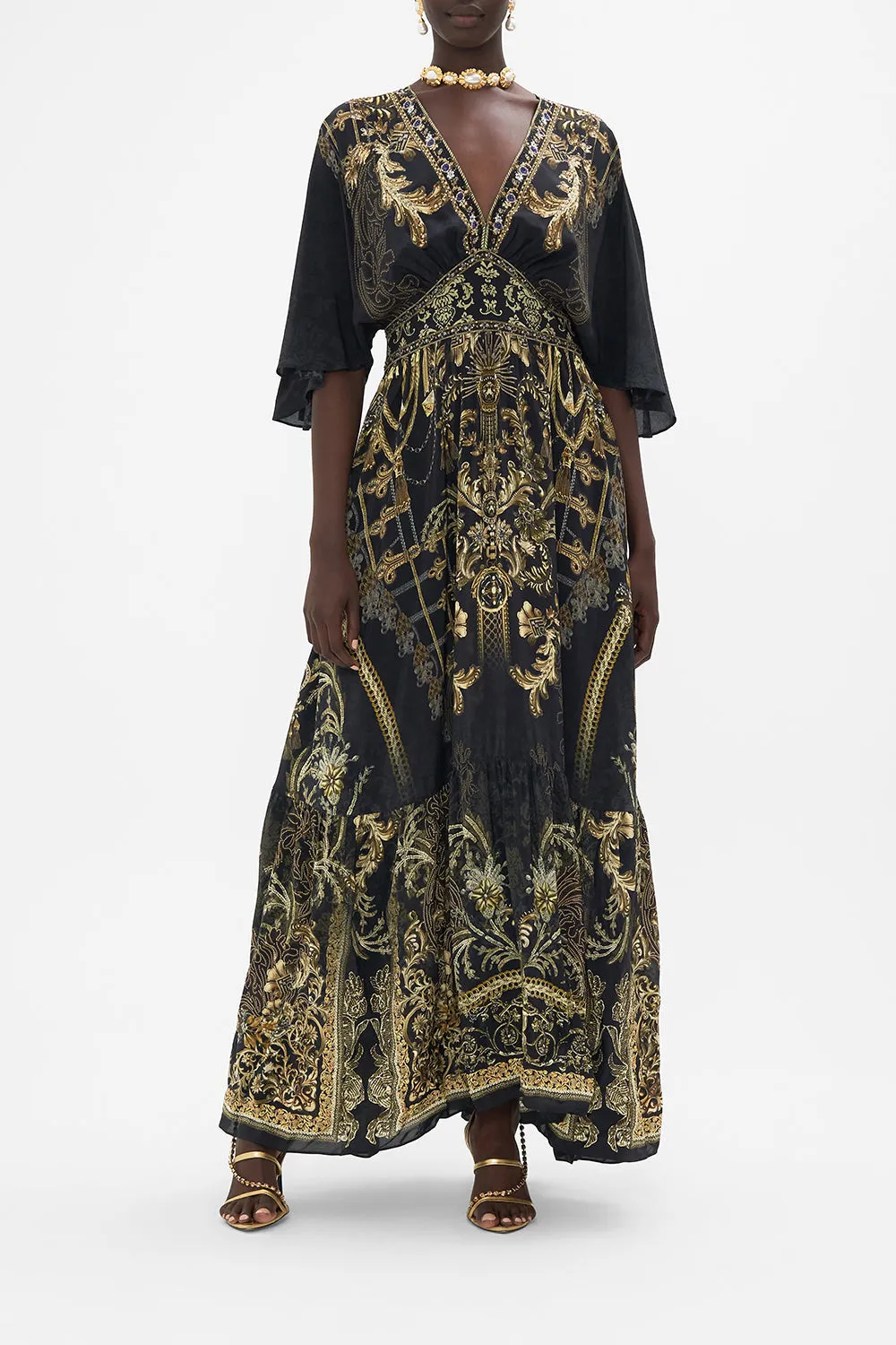 WAISTED DRESS WITH HEM RUFFLE THE NIGHT IS NOIR sold by Camilla