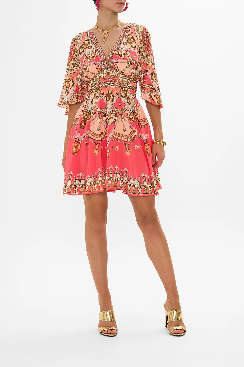 SHORT WAISTED DRESS SHELL GAMES sold by Camilla