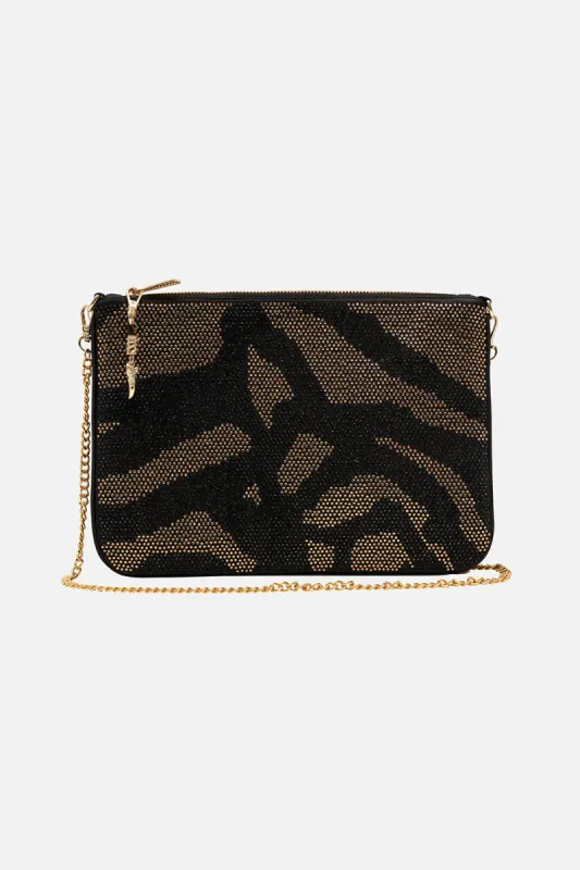 EMBELLISHED ZIP TOP CLUTCH WITH STRAP TAME MY TIGER sold by Camilla
