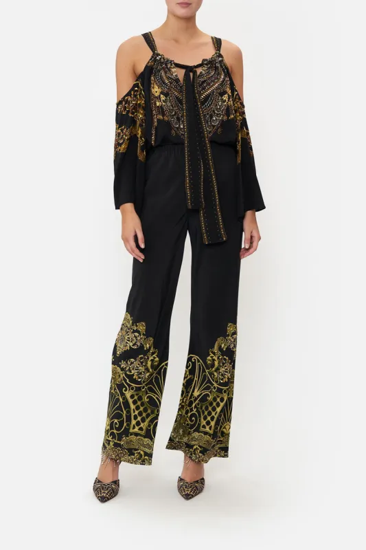 DROP SHOULDER FLARED TOP SHADOWS OF ARMADA sold by Camilla