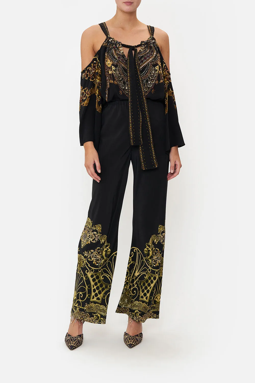 DROP SHOULDER FLARED TOP SHADOWS OF ARMADA sold by Camilla