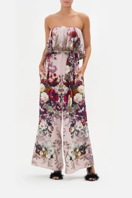STRAPLESS JUMPSUIT WITH FRILL GYPSY ROSE sold by Camilla
