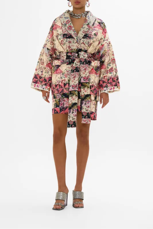 REVERSIBLE QUILTED COAT PATCHWORK POETRY sold by Camilla