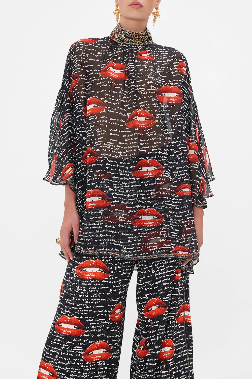 HIGH NECK RUFFLE SLEEVE BLOUSE CHAOS MAGIC sold by Camilla product image thumbnail 5