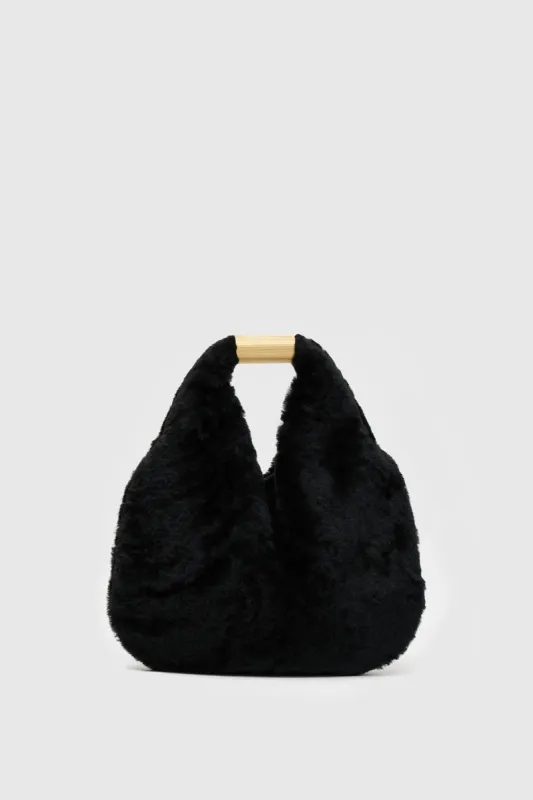 Remi Shearling Mini Bag sold by camilla & marc