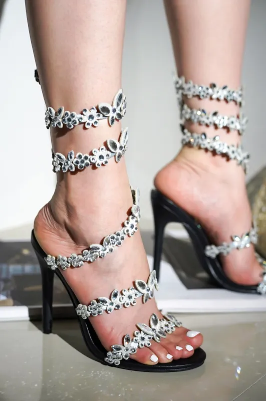Mariposa Rhinestone Floral Embellished Stiletto High Heel Sandals - Black sold by Cape Robbin