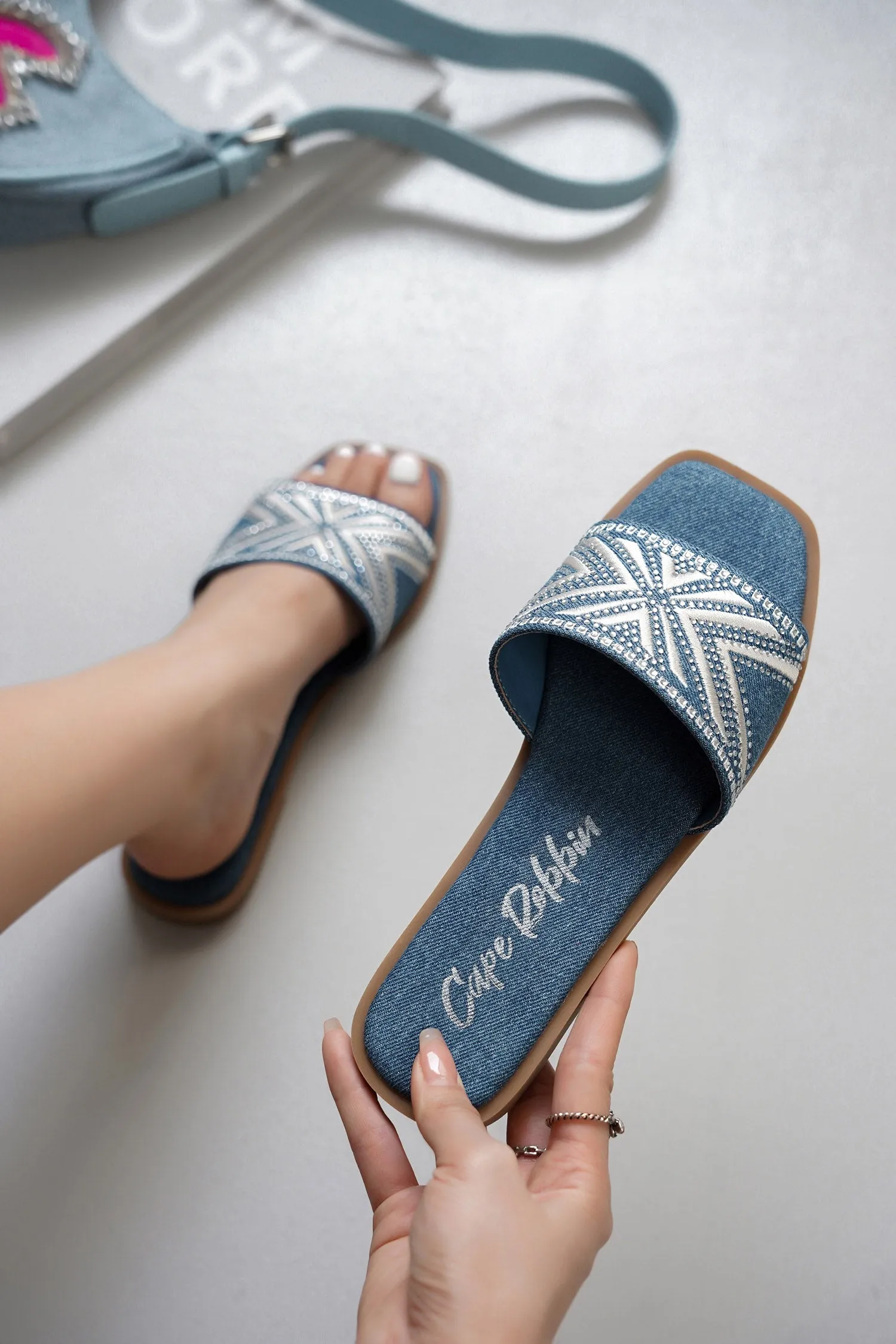 Anthe Rhinestone Embroidery Square Toe Slide Sandals - Denim sold by Cape Robbin