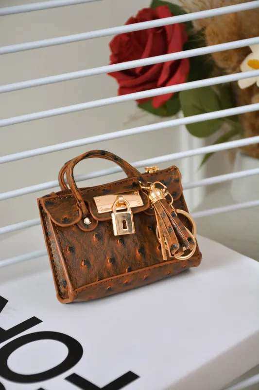 MOYNA - TAN sold by Cape Robbin