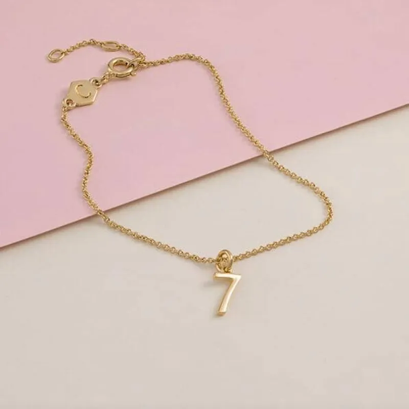 Sterling Silver Numbers Charms Bracelet sold by Capsul Jewelry