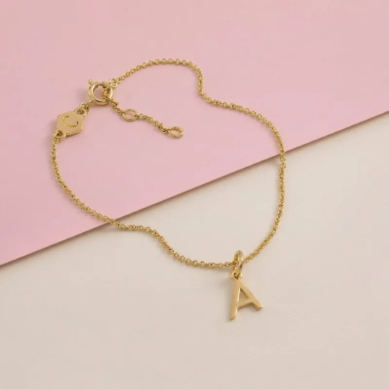 Sterling Silver Alphabet Initials Charms Bracelet sold by Capsul Jewelry