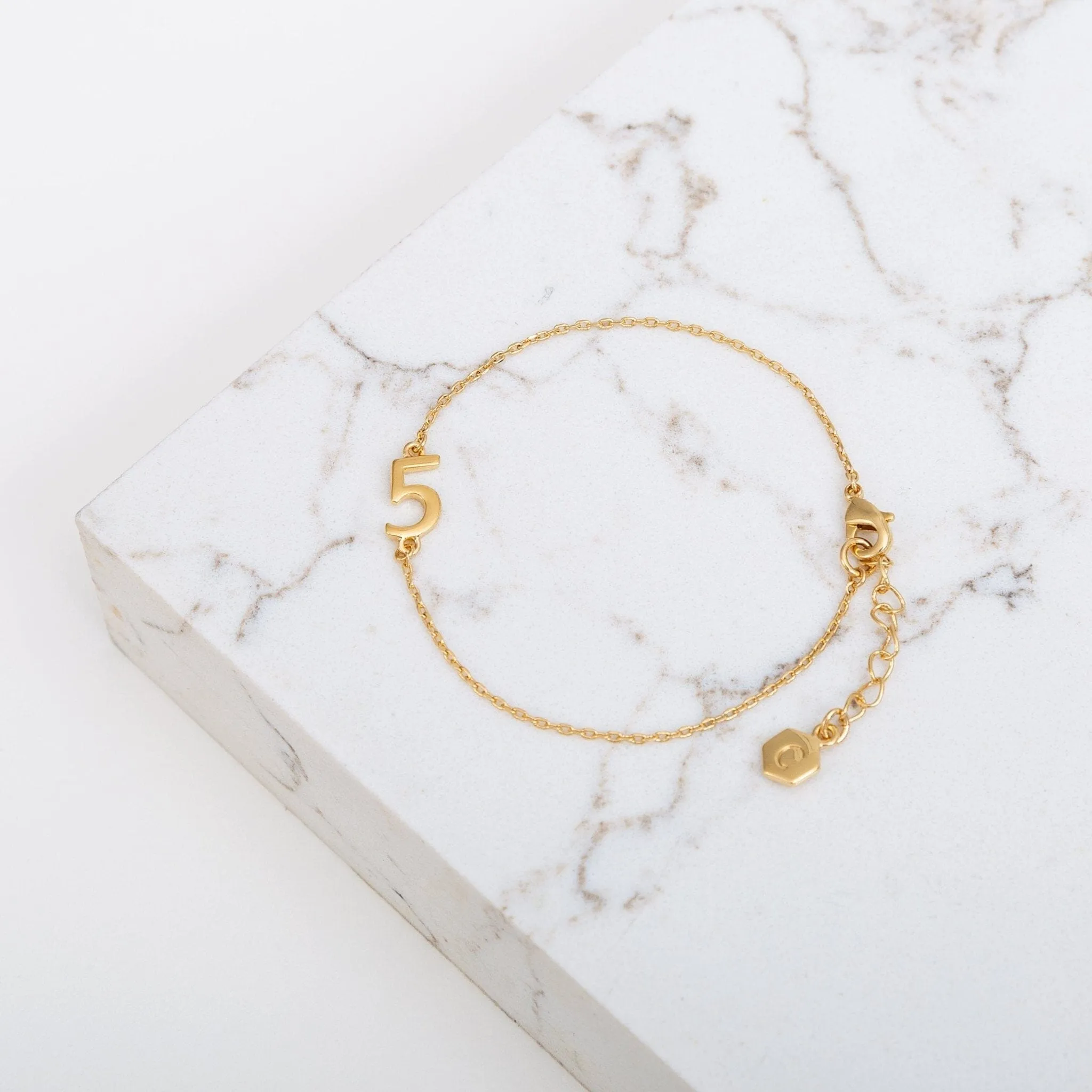 Personalized Numerology Bracelet sold by Capsul Jewelry