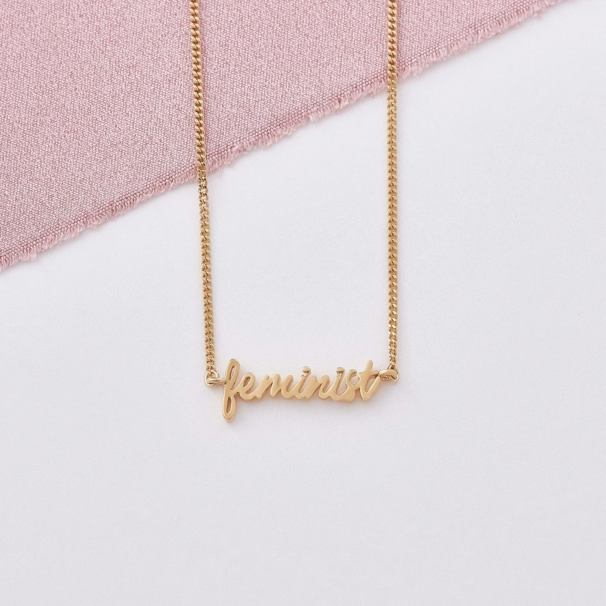 Feminist Signature Necklace sold by Capsul Jewelry