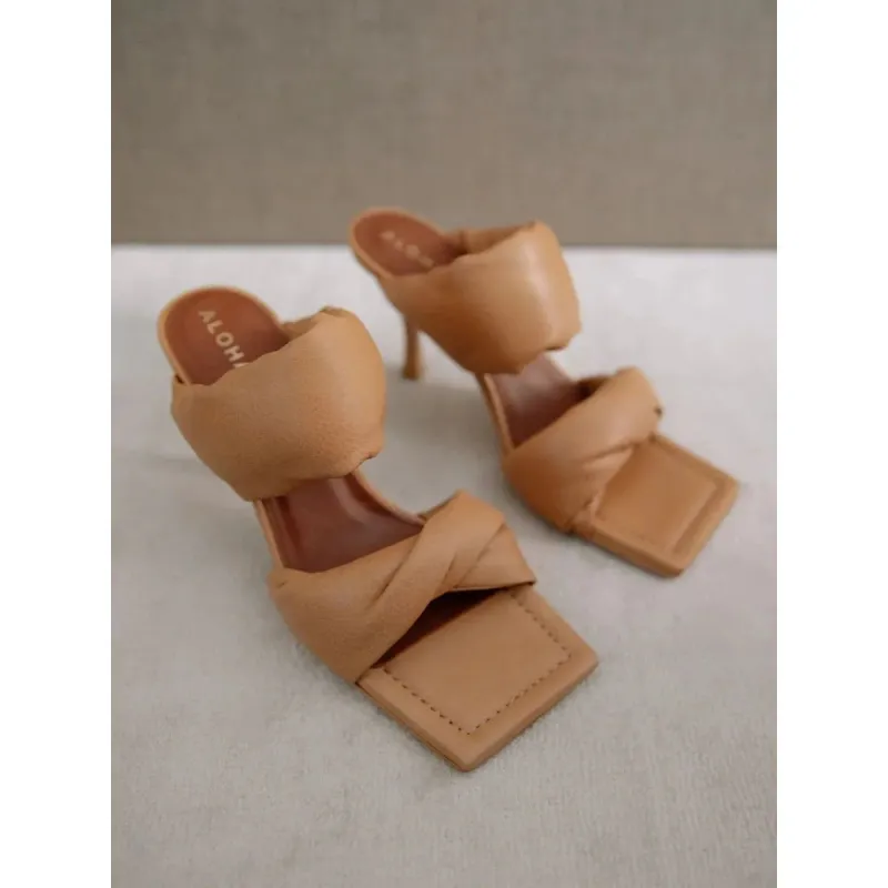 TWIST STRAP HEELS sold by Carbon