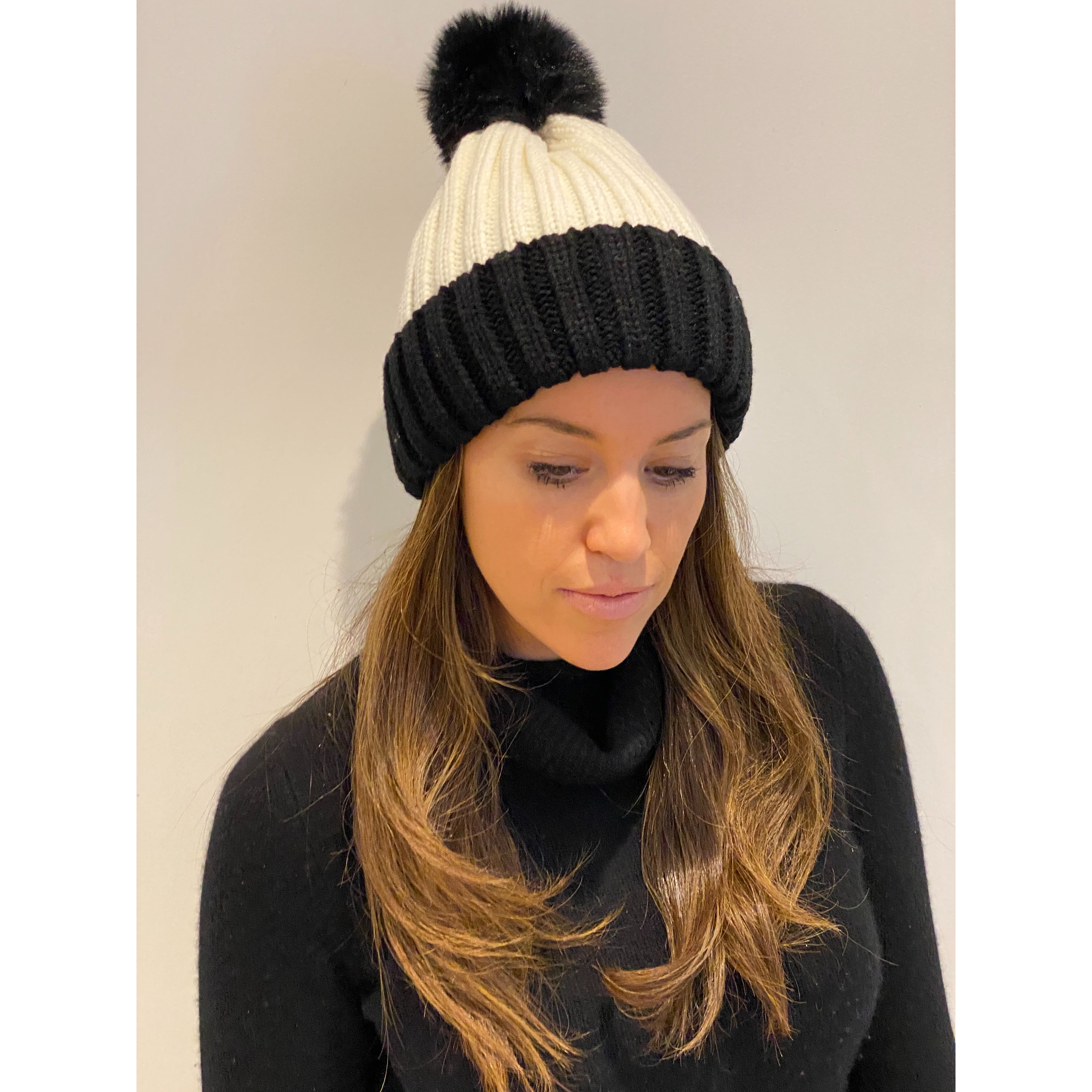 Black Pom Pom Hat sold by Carbon