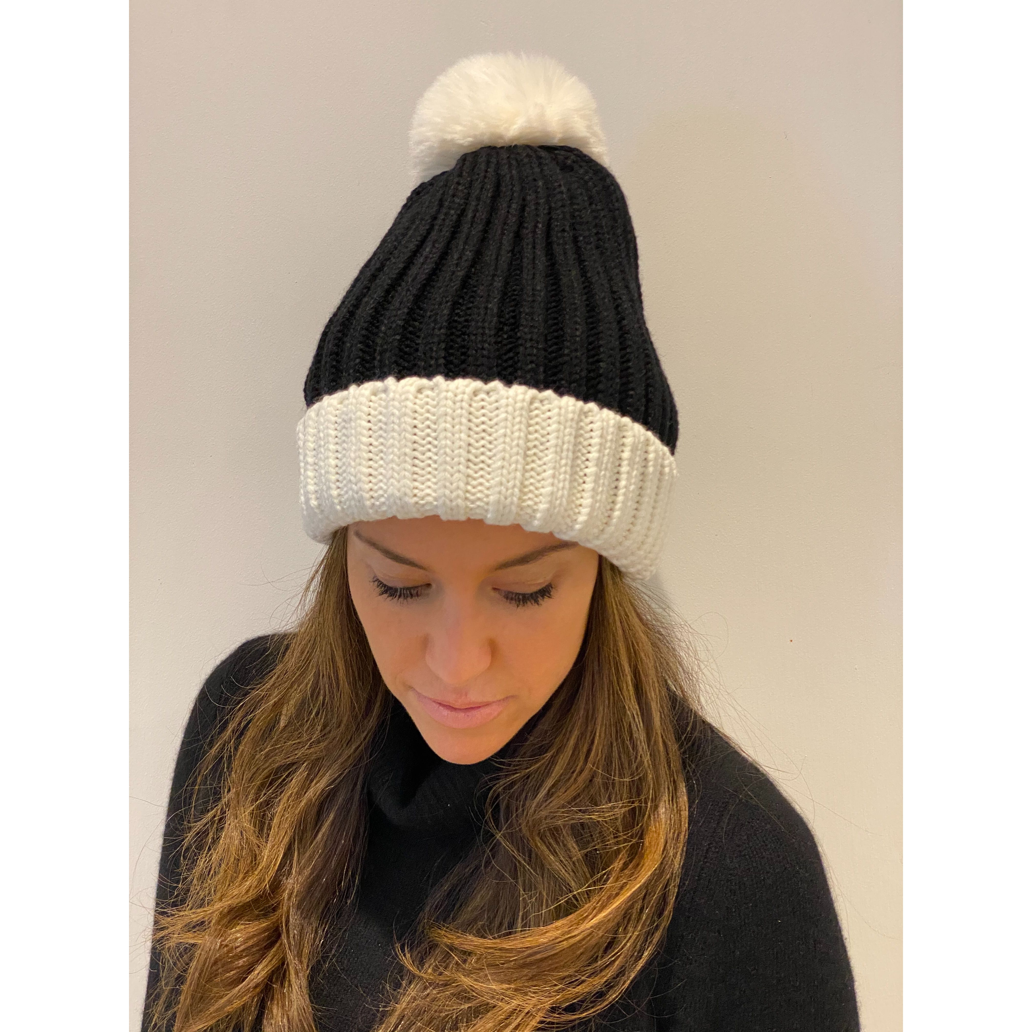 White Pom Pom Hat sold by Carbon
