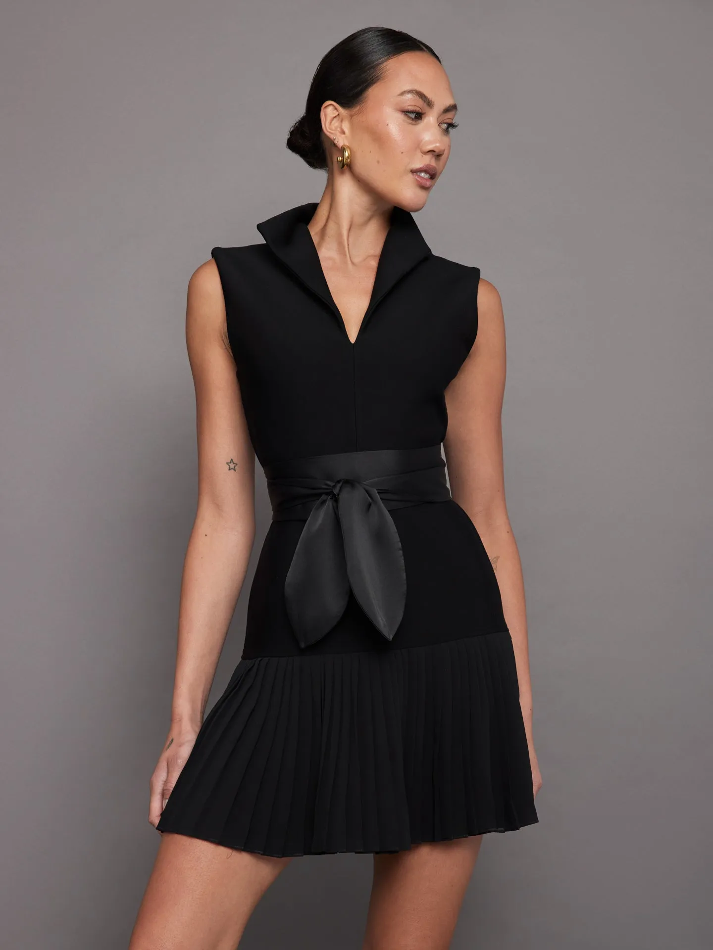 Pleated Tennis Dress - Black sold by Carbon38
